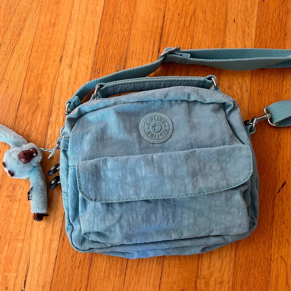 Beautiful KIPLING Purse with The Monkey Keychain.